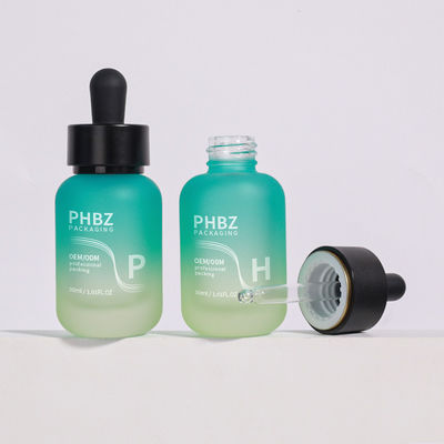ग्राहक की आवश्यकताओं के अनुसार सीरम ड्रॉपर बोतलें 30ml ग्लास राउंड मैट ड्रॉपर बोतल कैप टाइप टिकाऊ और पैकेजिंग विकल्प
