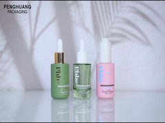 कॉस्मेटिक पैकेजिंग के लिए प्रिंटेड ग्लास 1oz फैंसी सीरम ड्रॉपर बोतलें